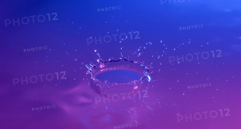 Purple and blue splashing water