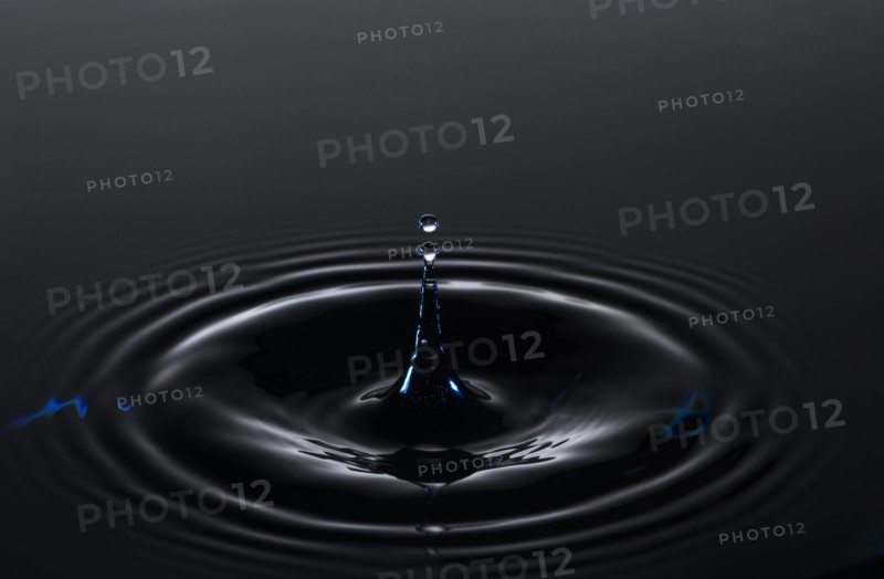Water drop creating circular ripples