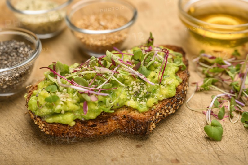 Avocado and bean sprouts on toast