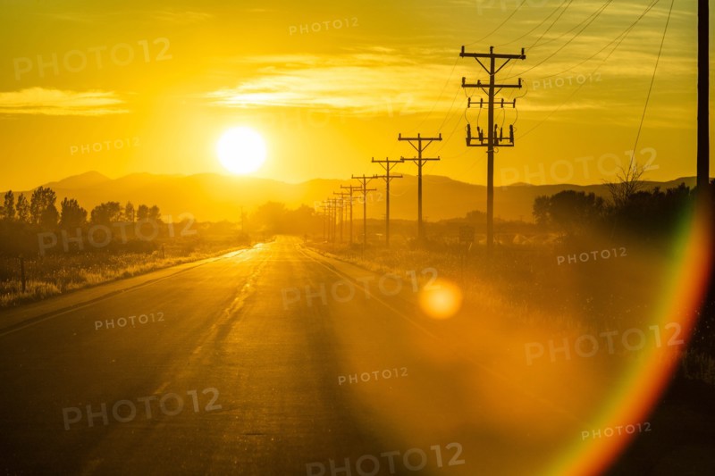 Sunset over country road in Picabo, Idaho, USA