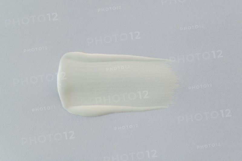 White brushstroke on paper