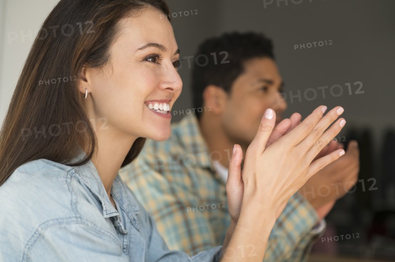Business people applauding during meeting
