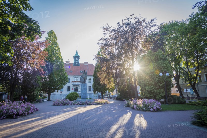 Town hall behind trees in Mragowo, Warmian-Masurian, Poland