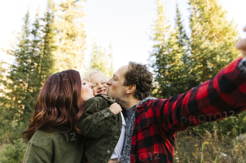 Family selfie in forest