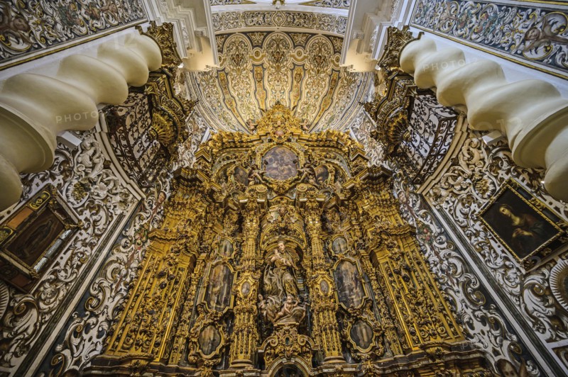Ornate alter in Church of Saint Louis of France in Seville, Andalusia, Spain