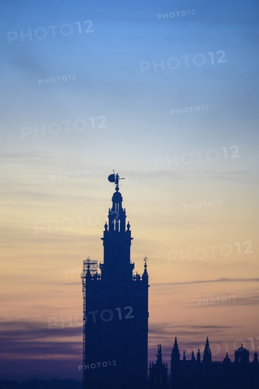 Silhouette of Giralda at sunrise in Seville, Andalusia, Spain