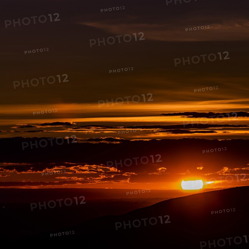 Silhouette of Boise Foothills at sunset in Boise, Idaho, USA