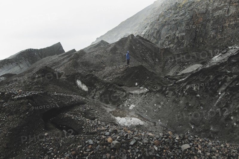 Man walking on rock in Skaftafell, Iceland