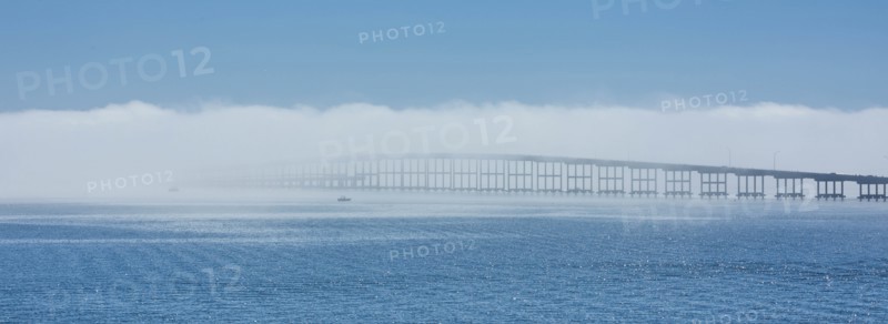 Bridge over sea in fog in Key Biscayne, Florida, USA