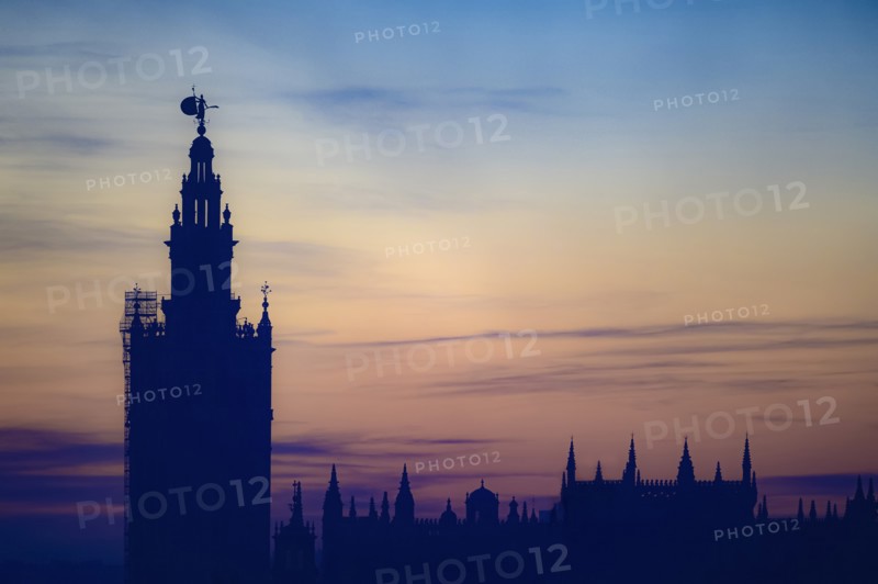 Giralda bell tower at sunset in Seville, Spain