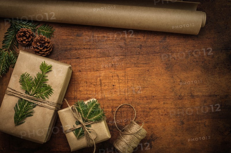 Pine fronds tied to Christmas presents