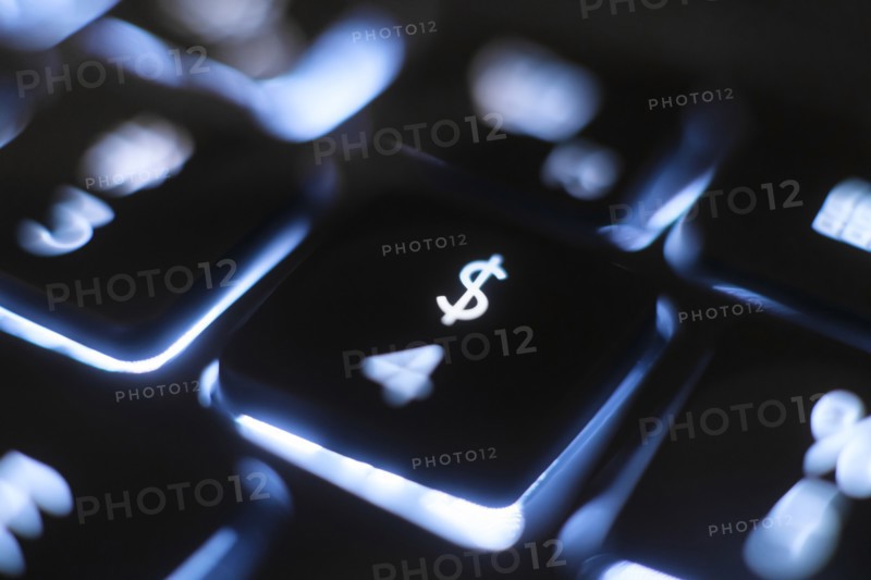 Illuminated dollar sign key on keyboard