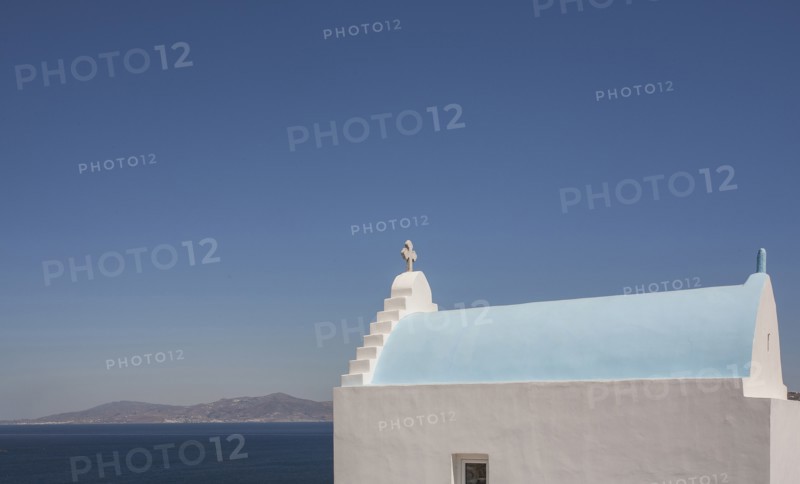 Roof of church by sea in Santorini, Greece