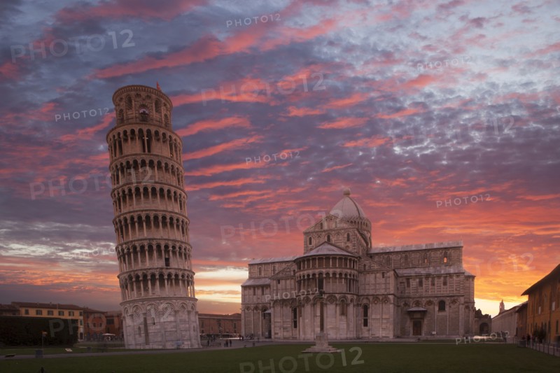 Leaning Tower of Pisa and Piazza dei Miracoli at sunset in Tuscany, Italy