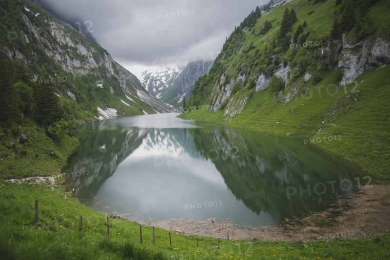 Lake in valley in Appenzell, Switzerland