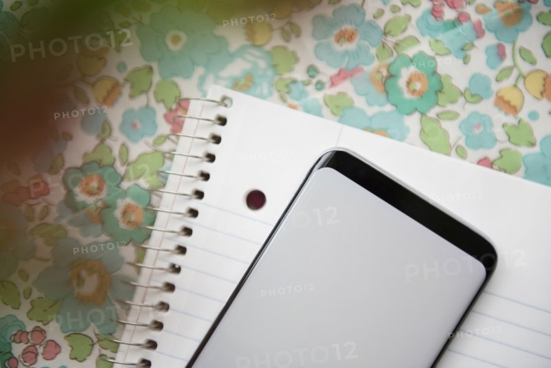 Smart phone on note pad