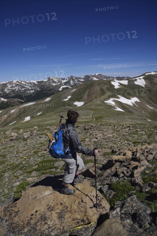 Woman looking at view while hiking in Loveland Pass, Colorado