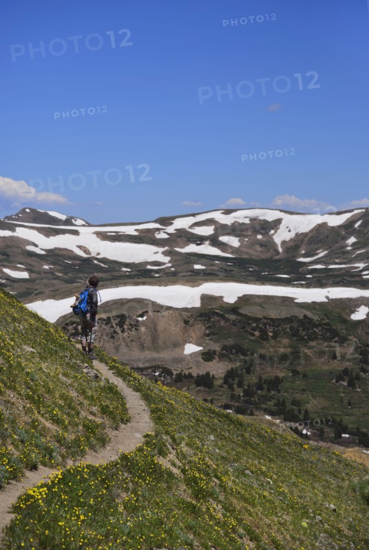 Woman looking at view while hiking on Loveland Pass, Colorado
