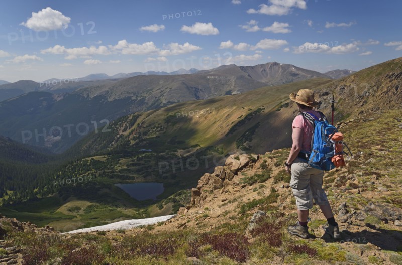 Woman looking at view while hiking on Mount Flora, Colorado