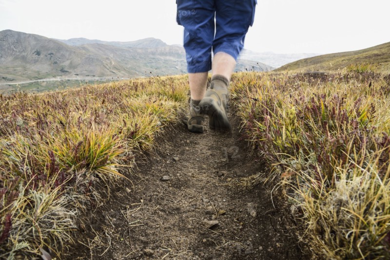 Legs of woman hiking Loveland Pass in Colorado