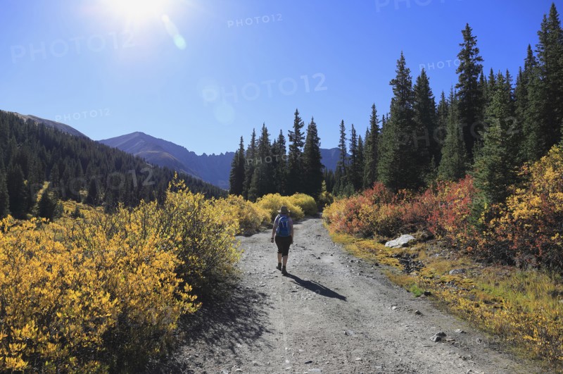 Woman hiking at Mayflower Gulch in Colorado