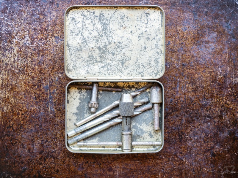 Drill bits in metal box