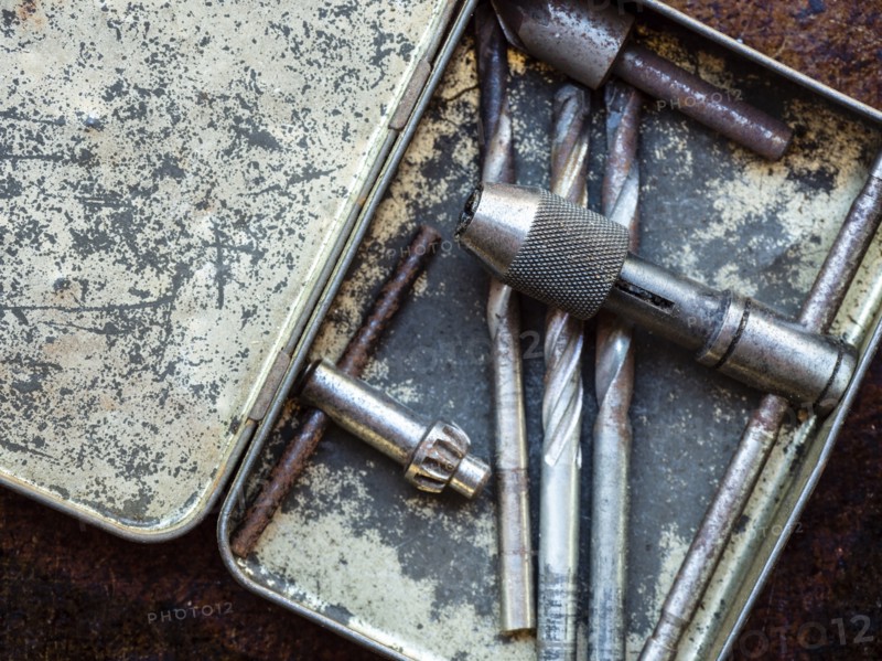 Drill bits in metal box