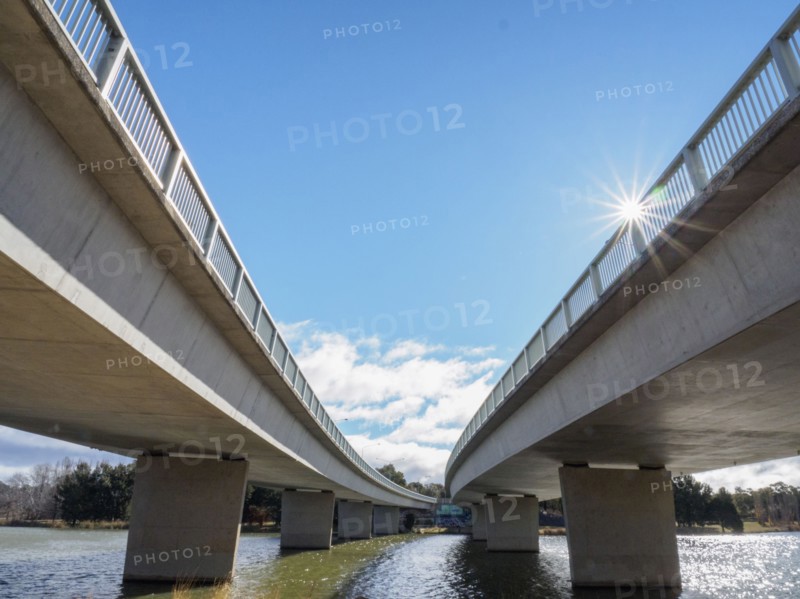 Low angle view of bridges under sunshine