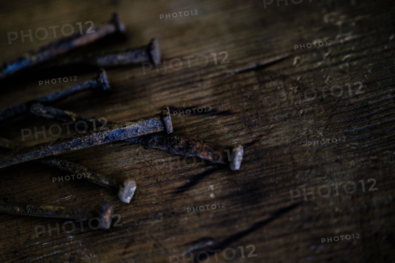 Nails on wooden table