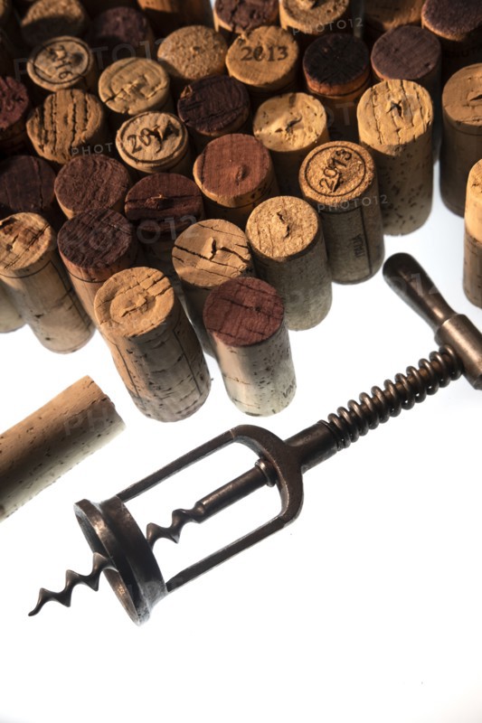 Corkscrew and collection of corks