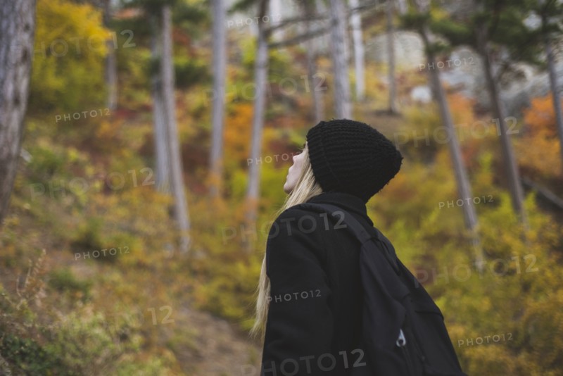 young woman in autumn forest