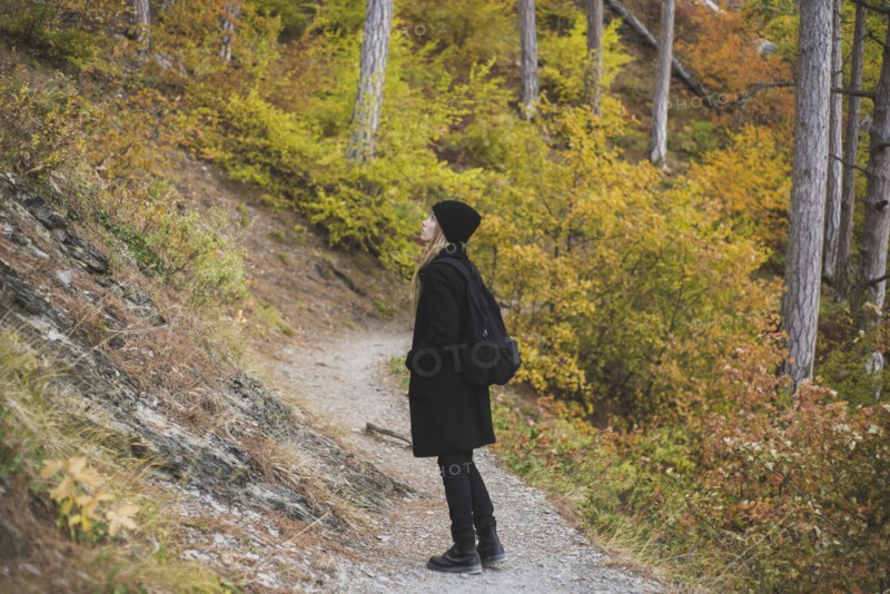 young woman in autumn forest