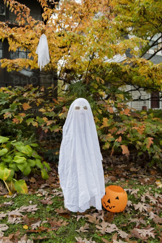 Boy in ghost costume for Halloween