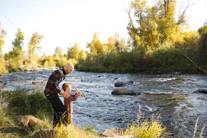 Father and son fishing together