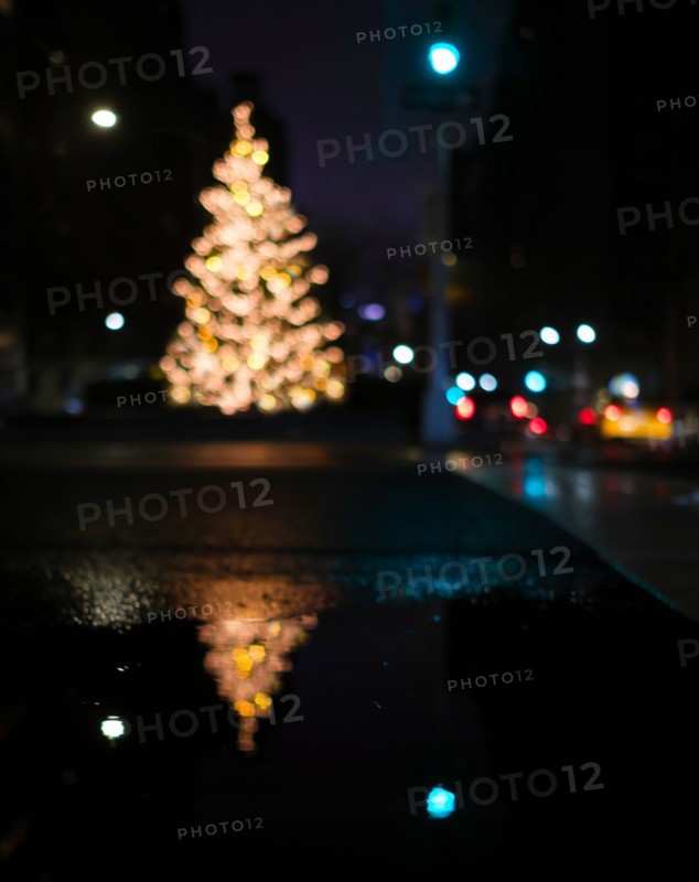 Defocussed Christmas tree illuminated at night