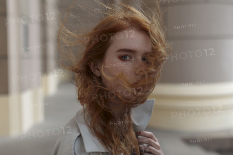 young woman with windblown hair