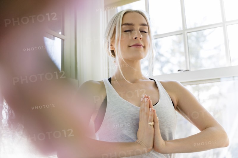 Young woman in yoga pose