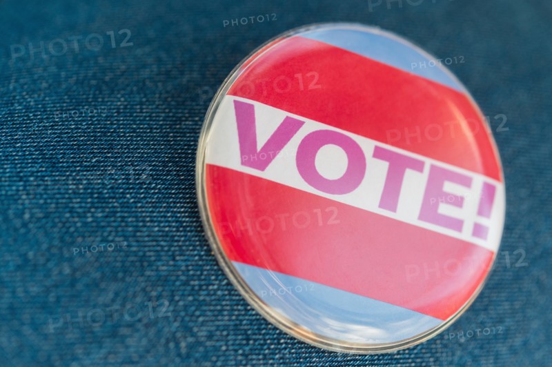 Close up of Vote button on jeans fabric