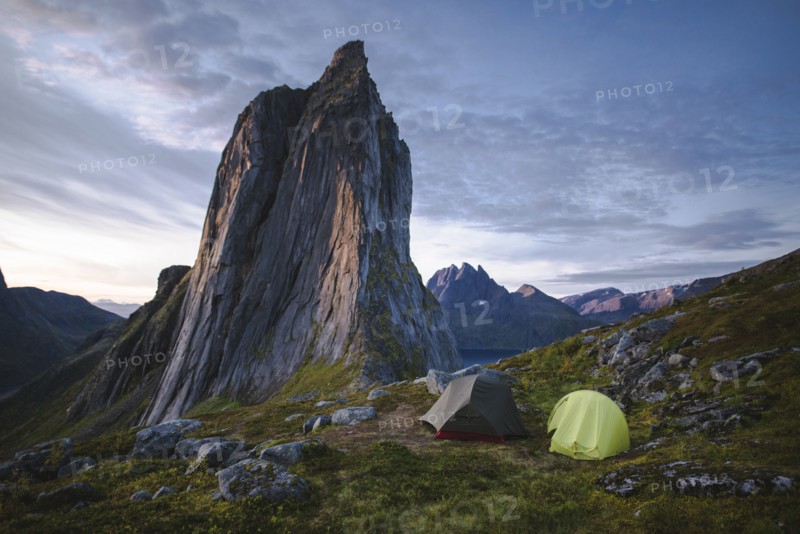 Norway, Senja, Two tents near Segla mountain at sunset