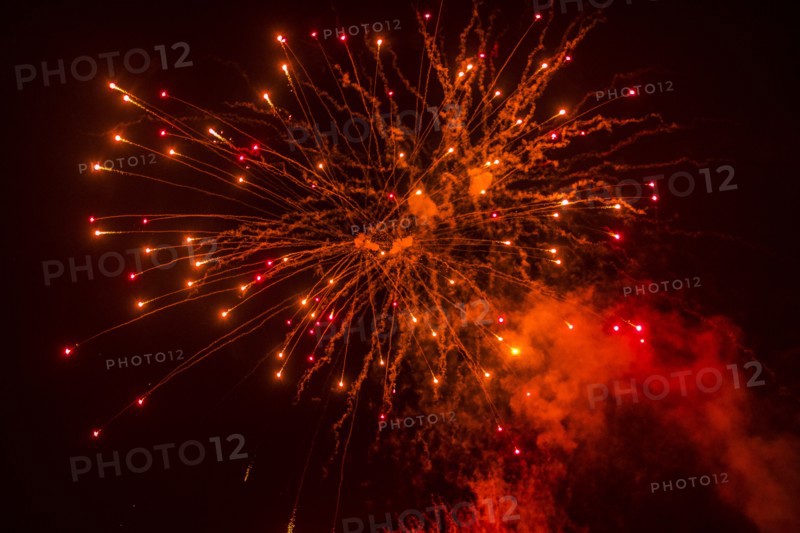 Red fireworks at night