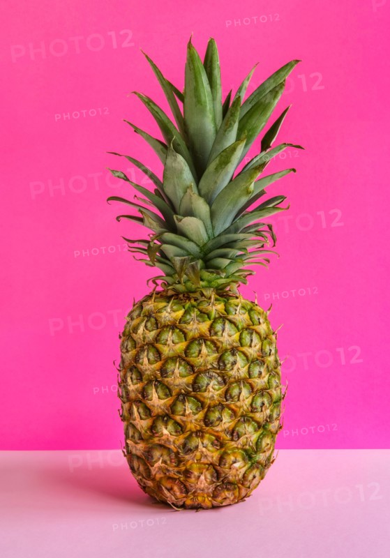 Pineapple against pink background