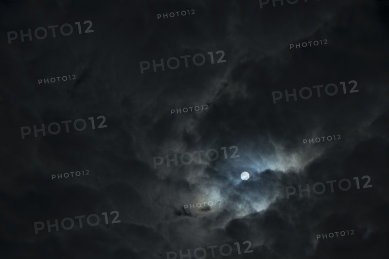 Full moon in dramatic night sky