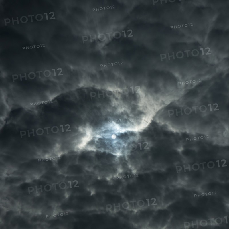 Full moon in dramatic night sky