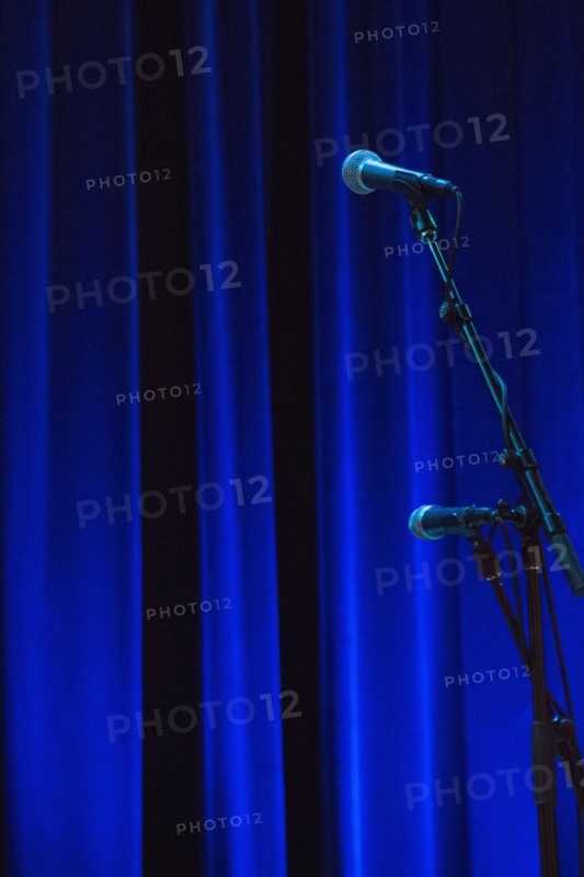 Microphone in front of stage curtain