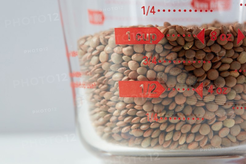 Lentils in measuring cup