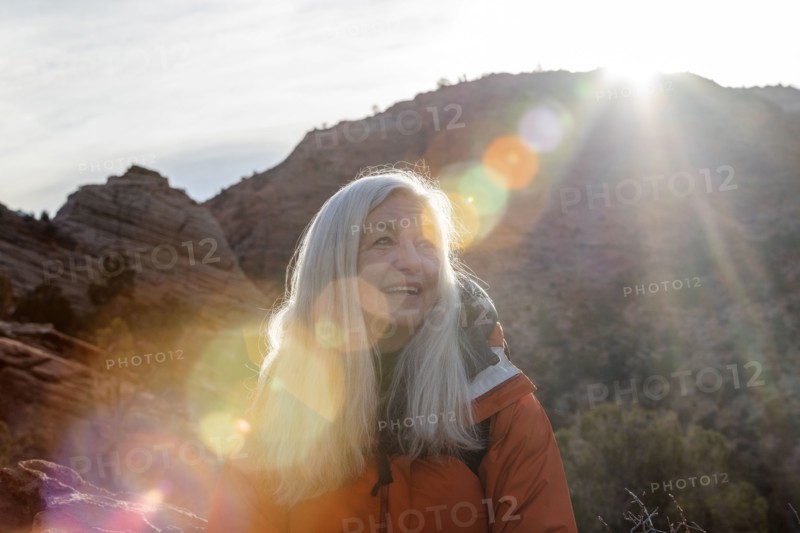 Smiling woman by canyon at Zion National Park in Utah, USA