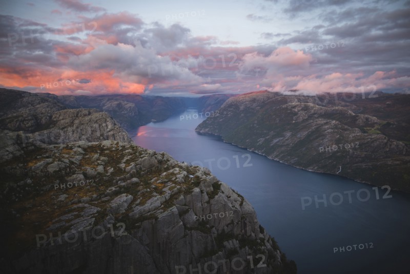 Preikestolen cliff by Lysefjord at sunset in Rogaland, Norway