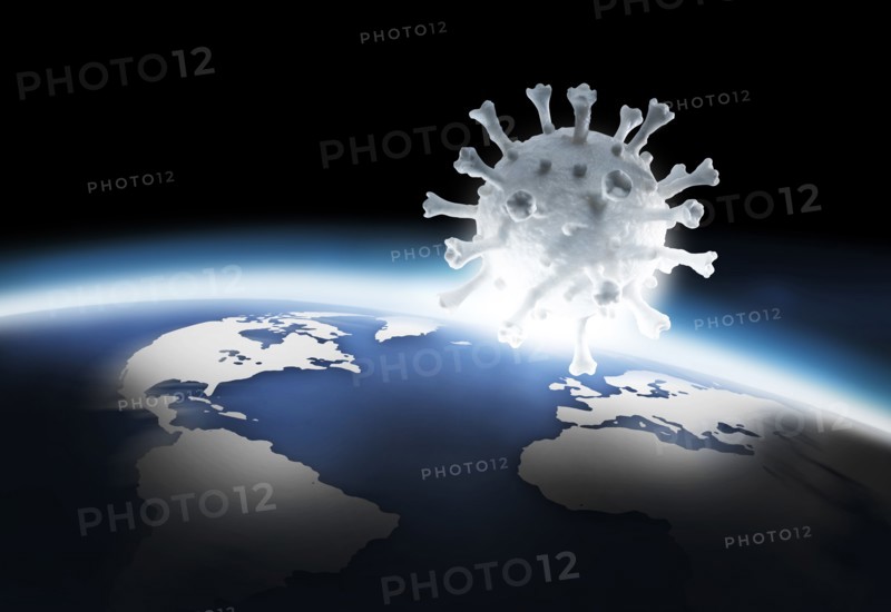 Digital image of model of Coronavirus floating over planet Earth