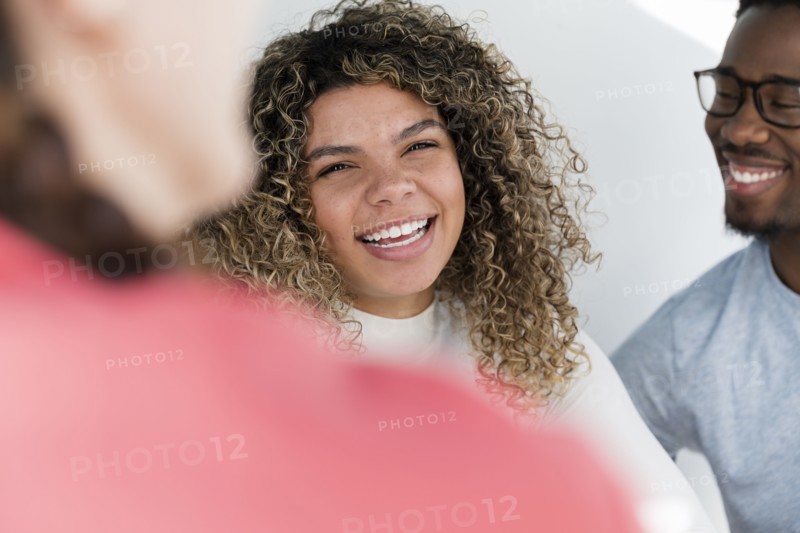 Portrait of woman hanging out with friends