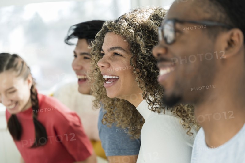 Group of friends laughing together